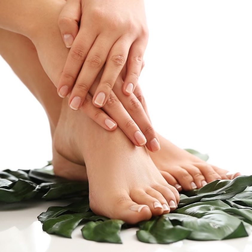 大female-bare-feet-hands-manicure-pedicure-concept_144627-42165